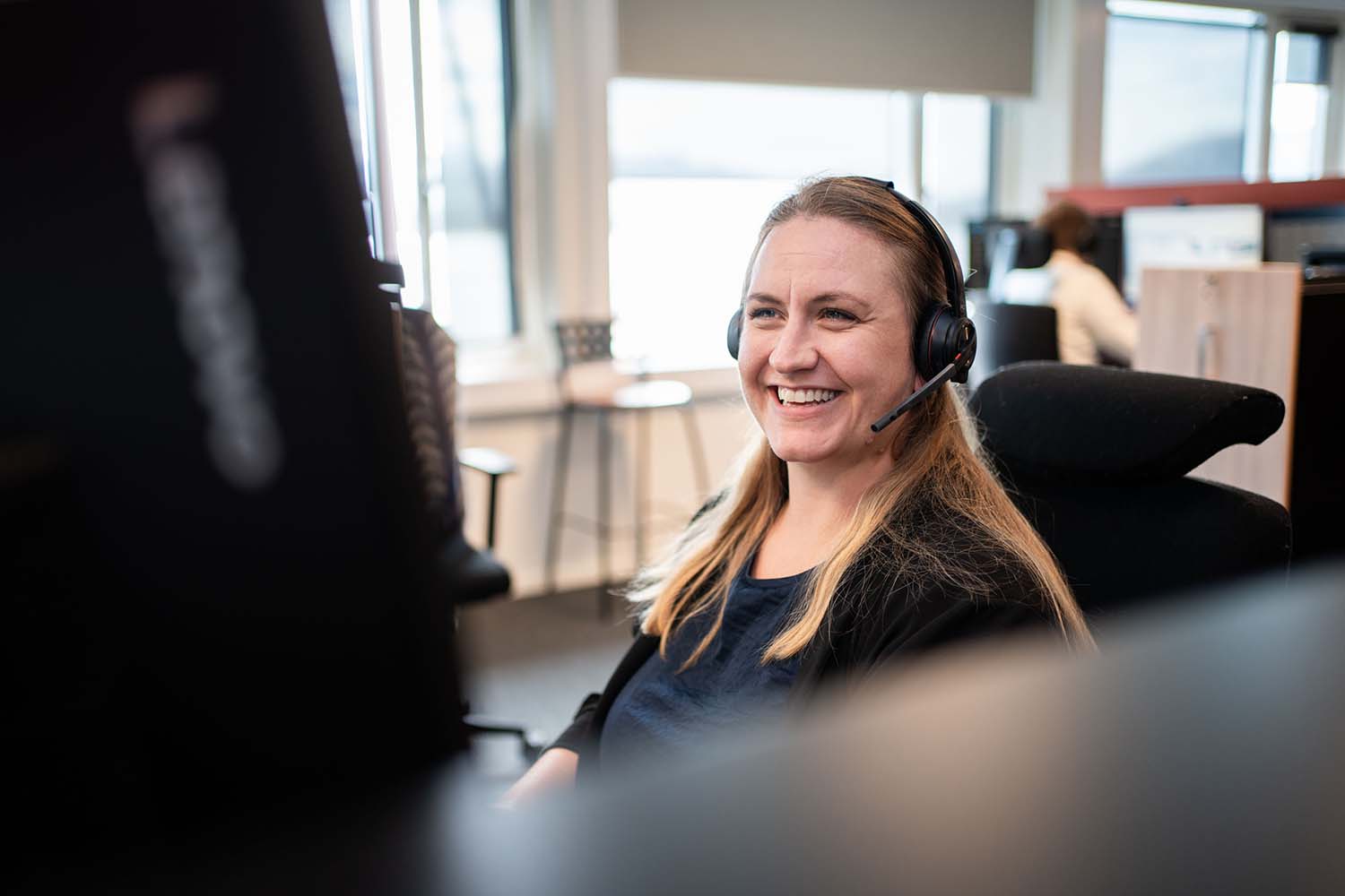 Kundesupport ELinn sitter klar for å hjelpe